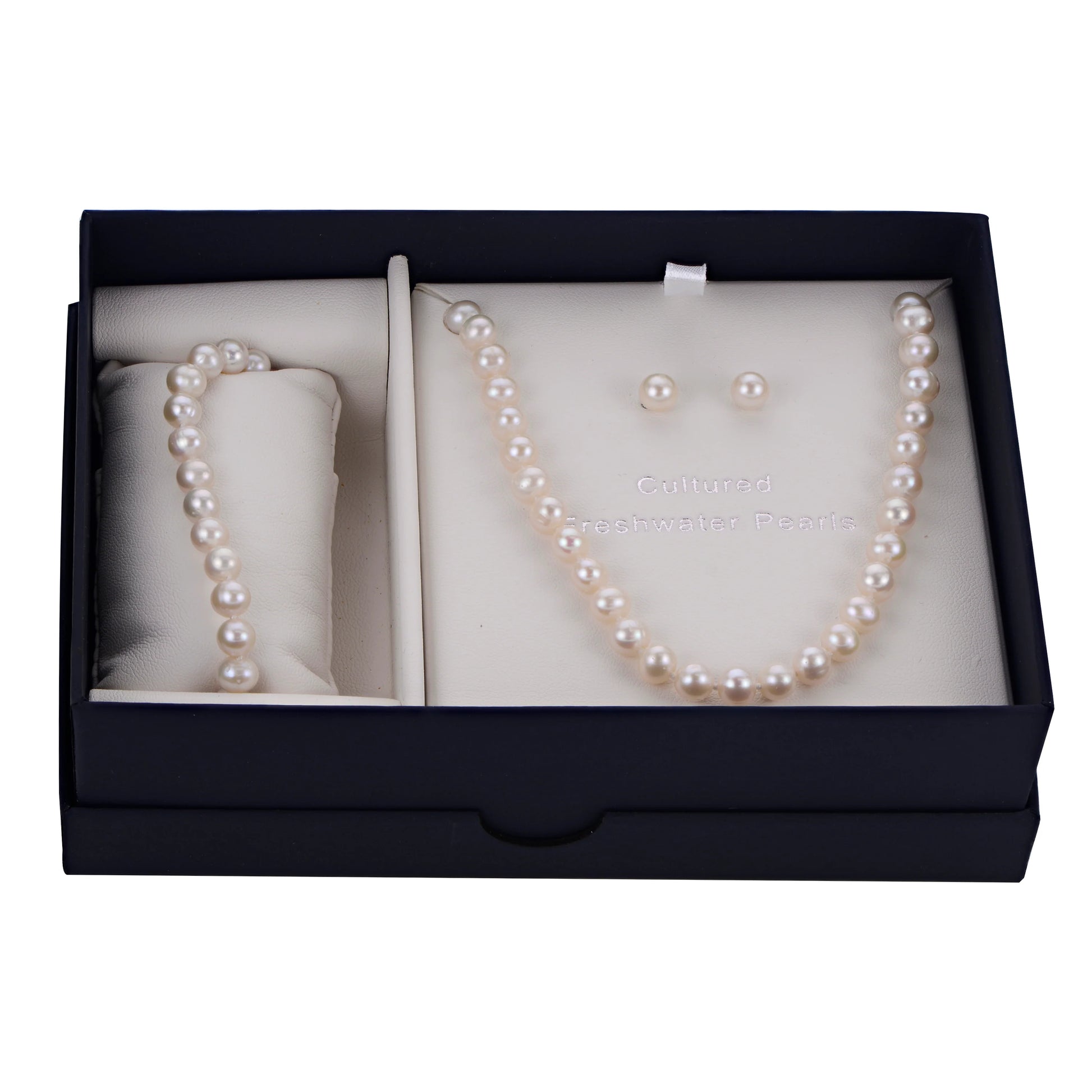 pearl strands and earrings in a blue box on a white background