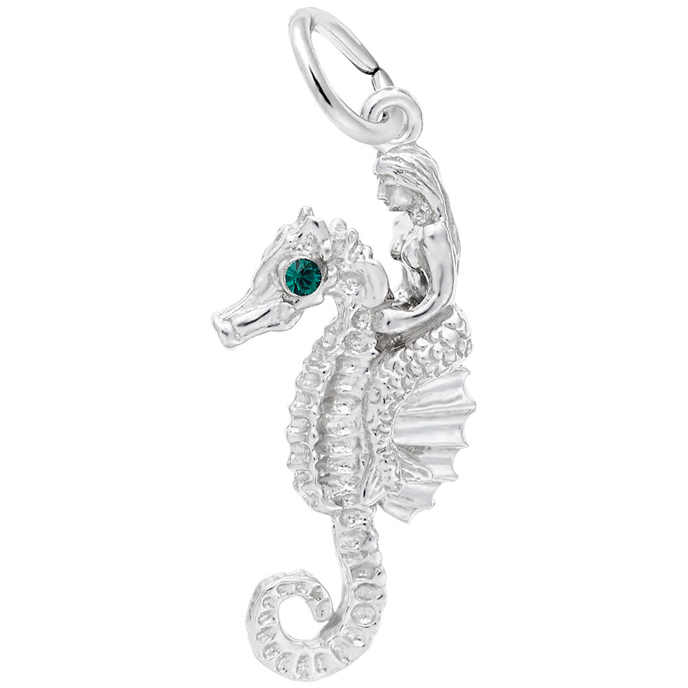 Silver seahorse, with green gemstone eyes, and mermaid charm on a white background
