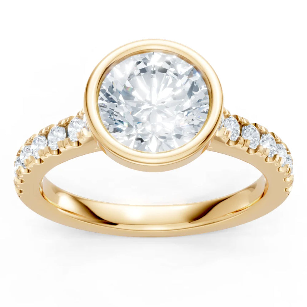 Gold ring with a large diamond and smaller diamonds on the band against a white background