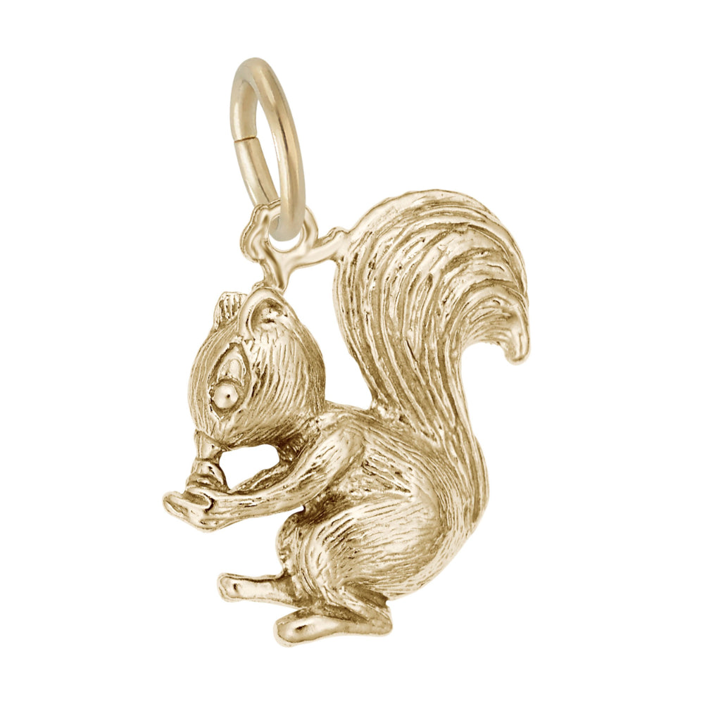 Gold squirrel charm on a white background