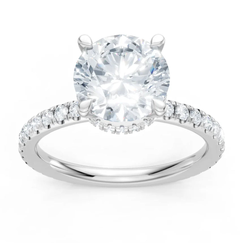 Diamond ring with a clear gemstone on a white background
