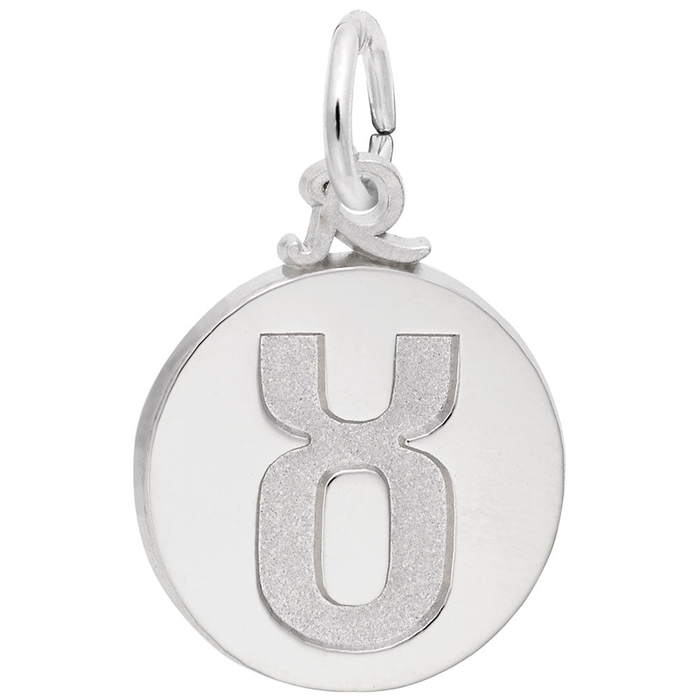 Silver disc charm with the Taurus symbol engraved in the center, shown on a white background