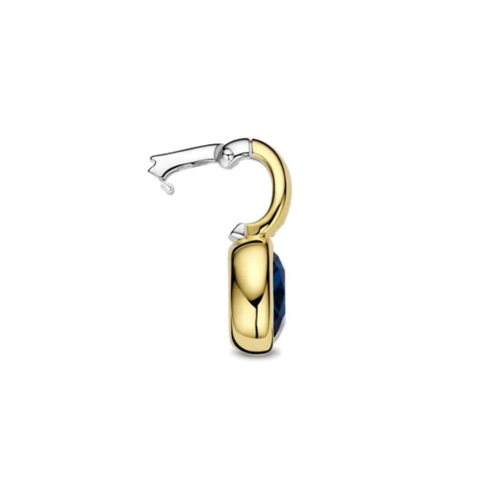 A pendant with detachable clasp and a small dark blue gemstone inset, shown on a plain white background.