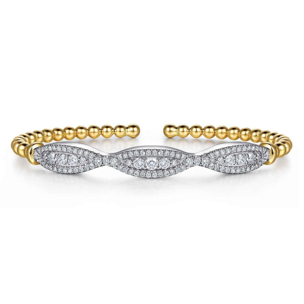 silver and gold tone beaded bracelet with clear stones on a white background