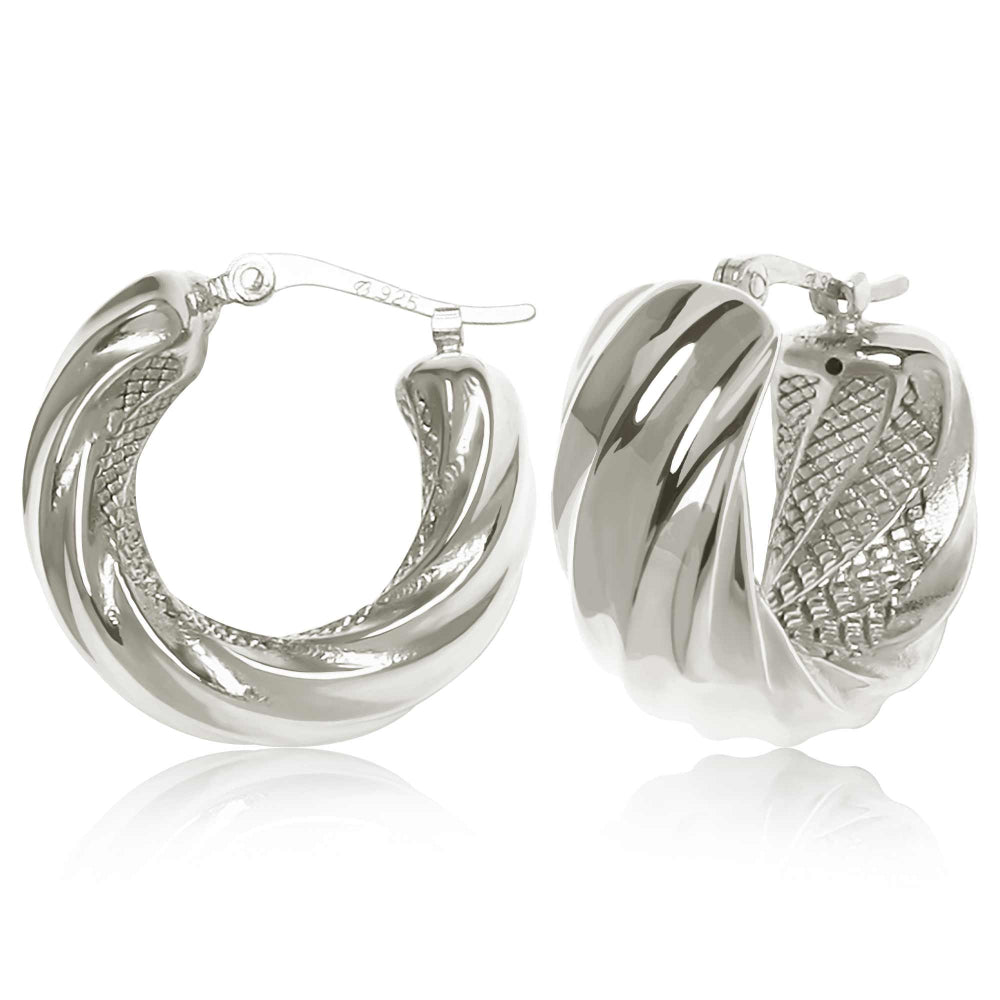 Pair of silver hoop earrings on a white background