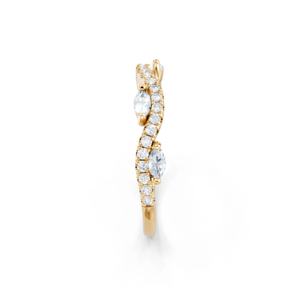 Gold ring with diamond accents on a white background
