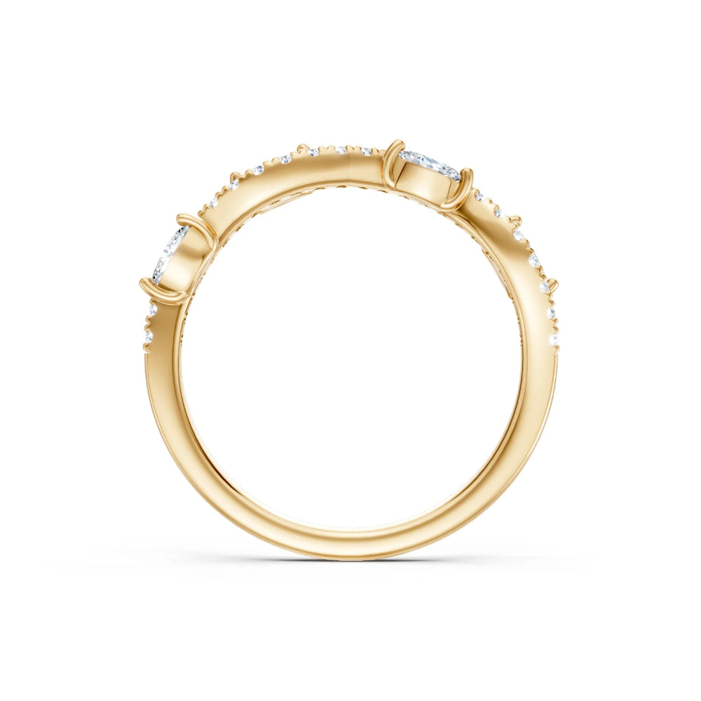 Gold ring with small diamonds on a white background