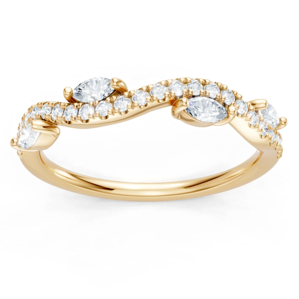 Gold ring with diamond accents on a white background