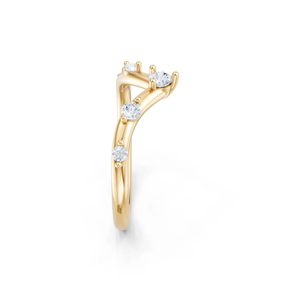 Gold ring with diamonds on a white background