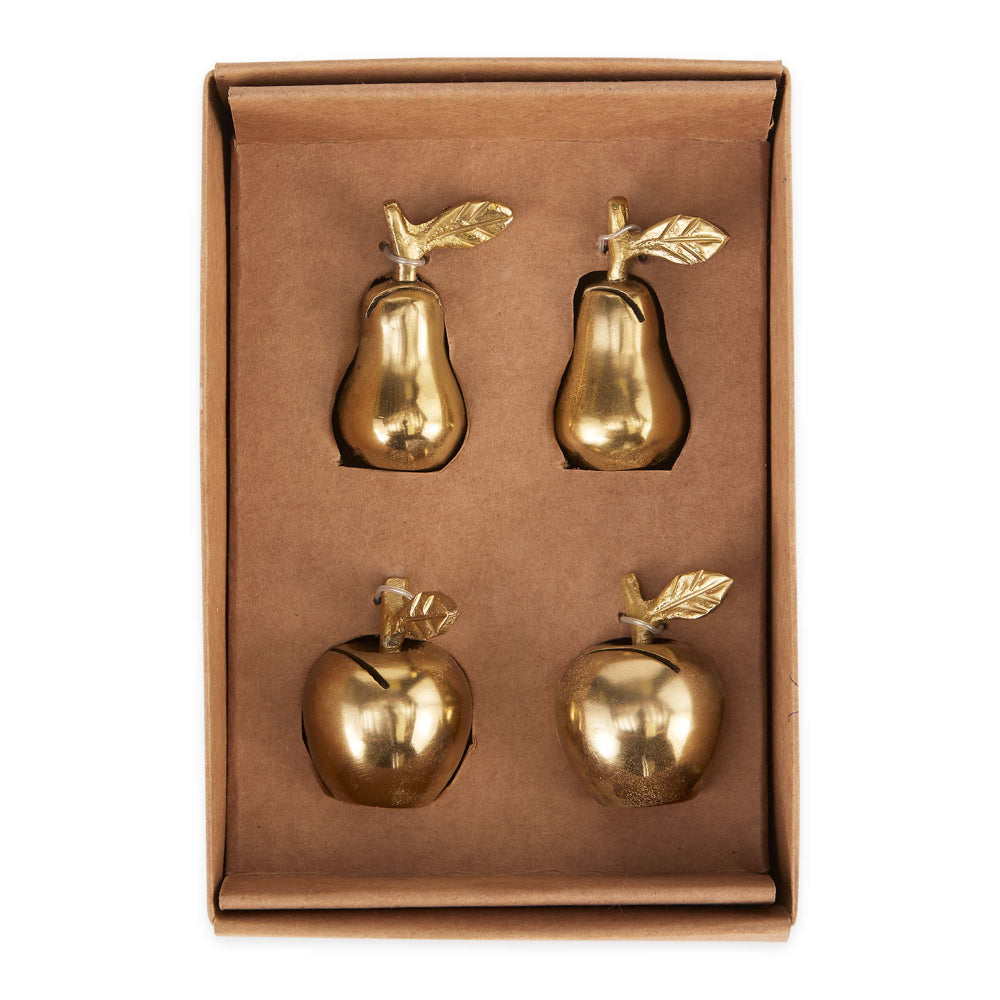 Set of four gold pear and apple-shaped objects in a box on a white background