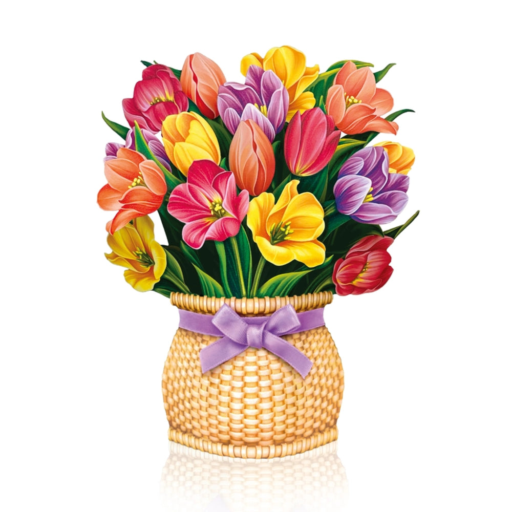 Colorful bouquet of tulips in a woven basket with a purple ribbon on a white background