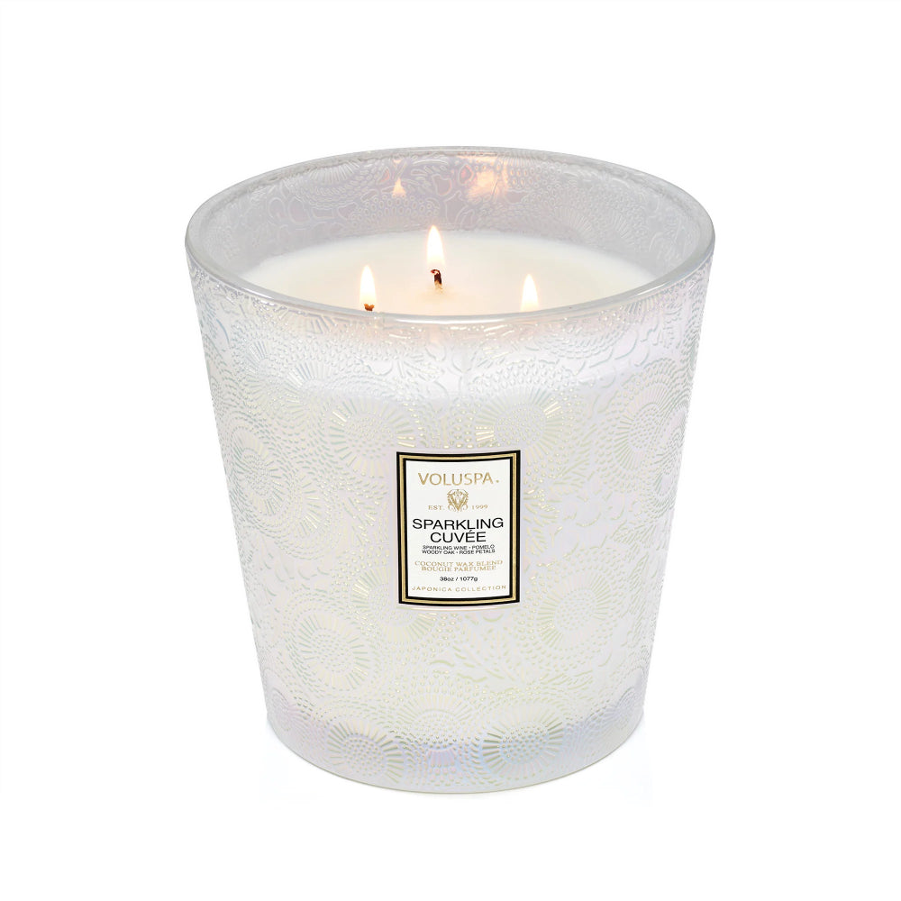 Clear white Sparkling Cuvee candle on a white backround. 
