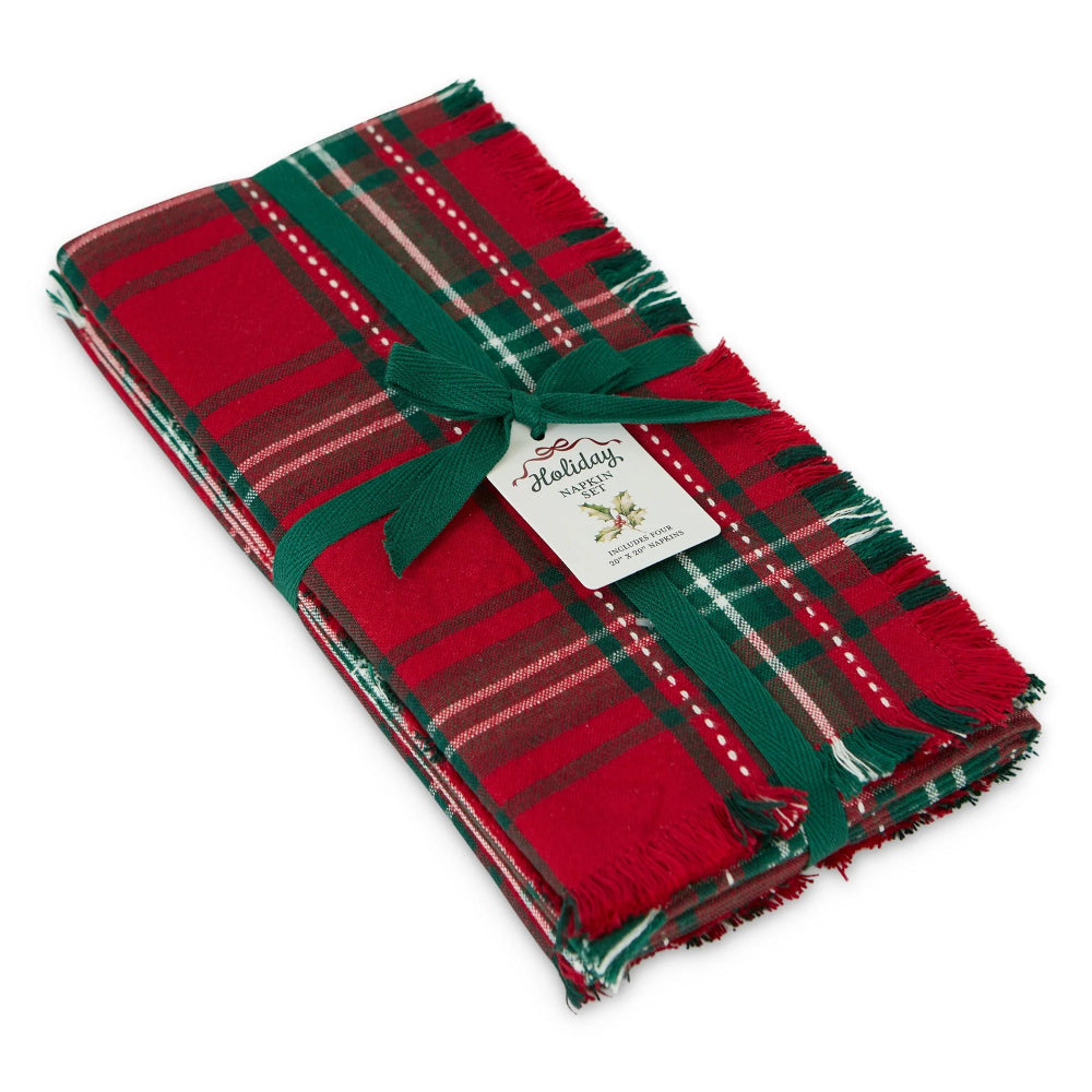 Red and green plaid blanket with a green ribbon on a white background