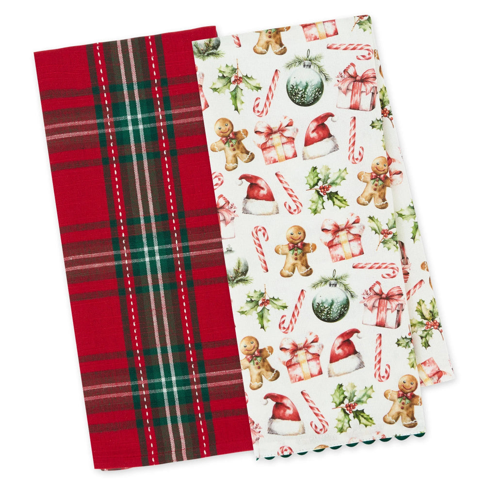 Two Christmas-themed fabric napkins or table linens on a white background. One has a red, green, and beige plaid pattern, and the other has a white background with a festive print of gingerbread men, candy canes, Santa hats, gifts, and holly.