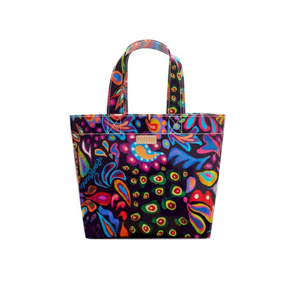A multicolored floral tote bag with a ConsuelaCloth exterior.