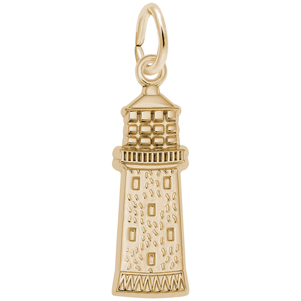 A gold lighthouse charm with a textured body, detailed windows, and a top hanging loop, shown on a plain white background.