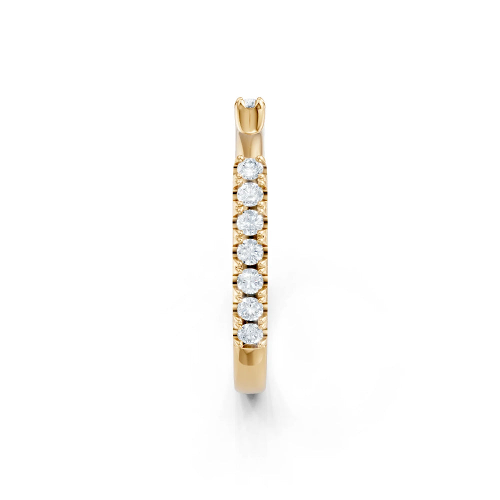 Gold necklace with round diamonds on a white background
