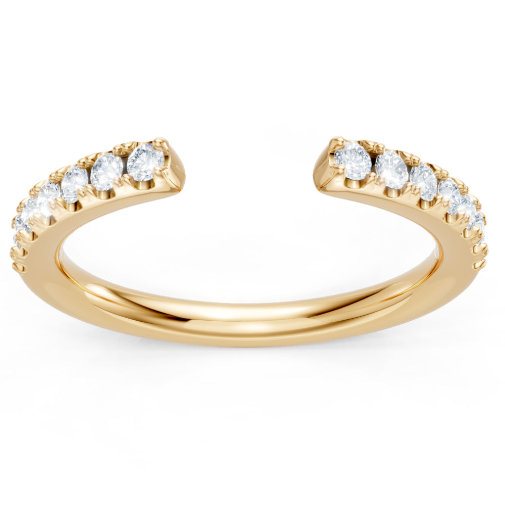 Gold ring with small diamonds on a white background