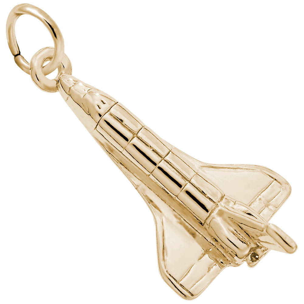 Gold space shuttle charm on a white background