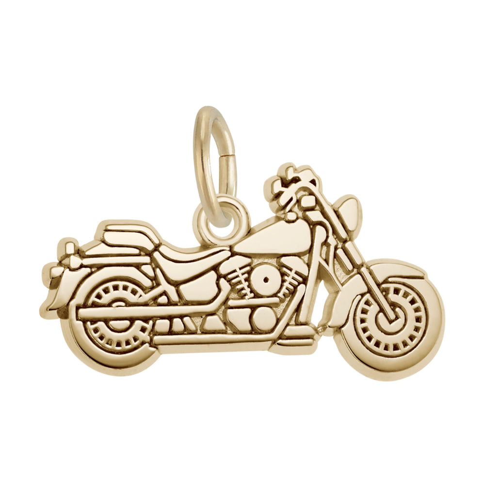 A gold motorcycle charm with an engraved side-profile design, shown on a plain white background.