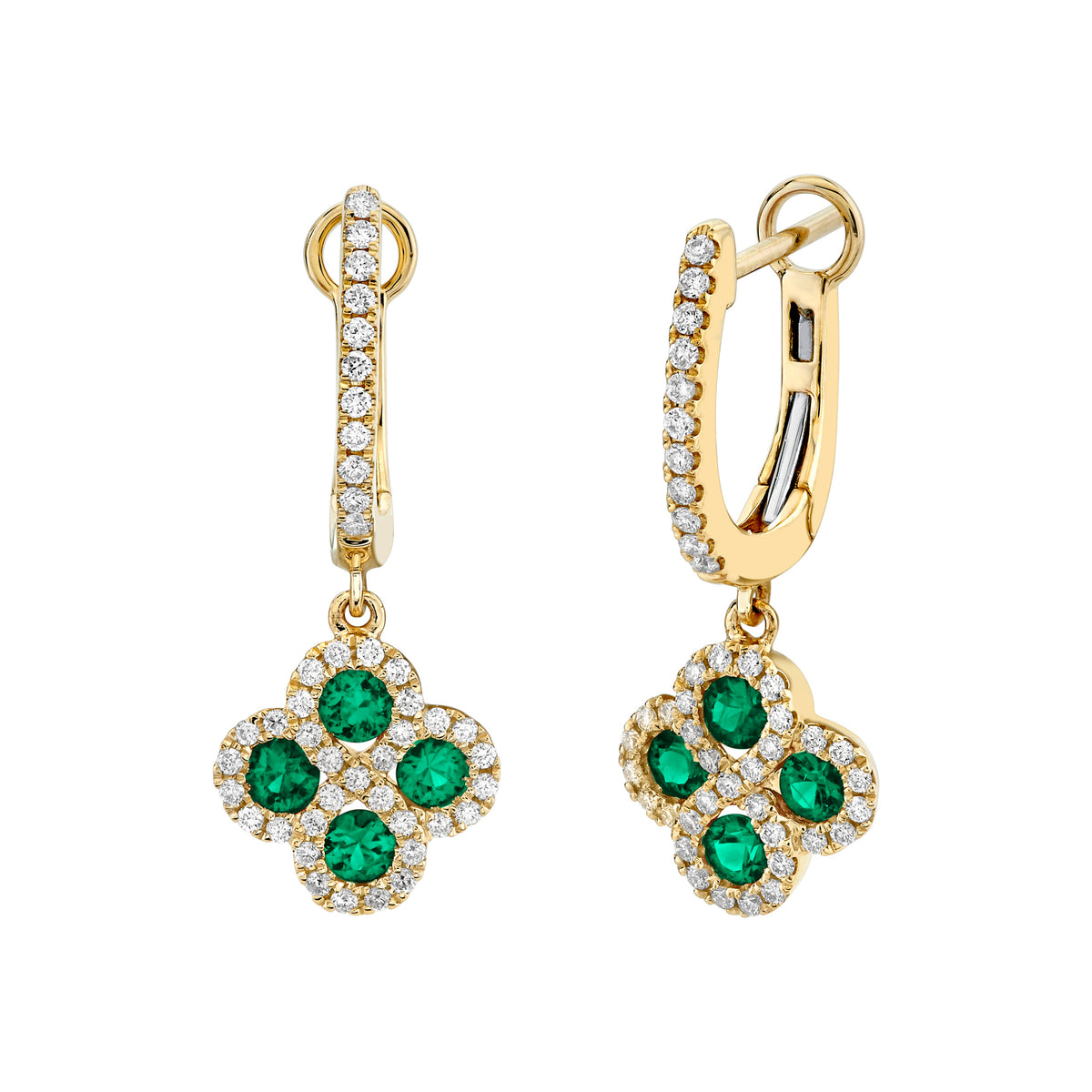 A pair of gold huggie hoop earrings with green and clear gemstone floral drops, shown on a plain white background.