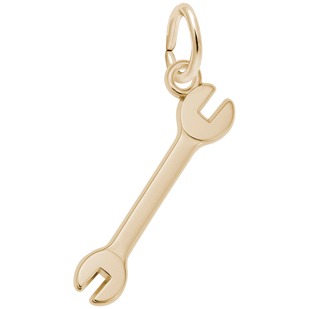 Polished gold wrench charm on a white background