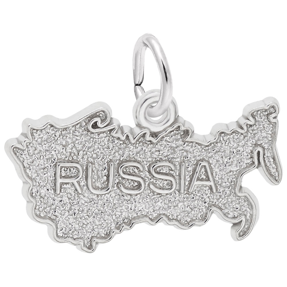 Silver charm shaped like the map of Russia with 'RUSSIA' engraved on a white background