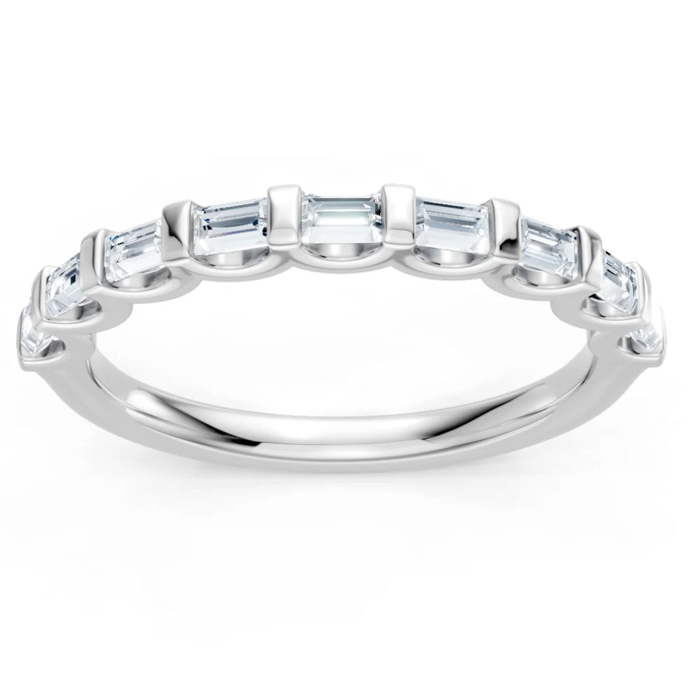 Silver ring with baguette-cut diamonds on a white background