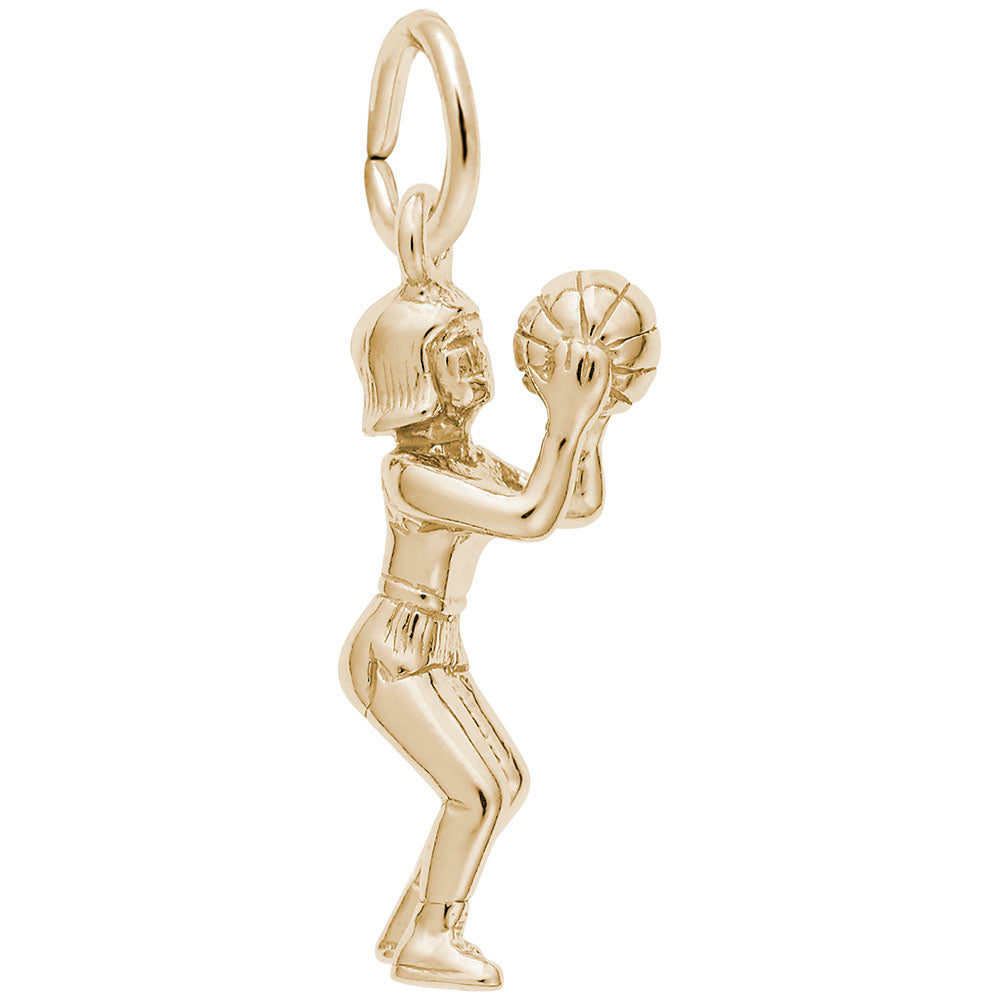 Polished gold charm of a child laying basket ball, shown on a plain white background