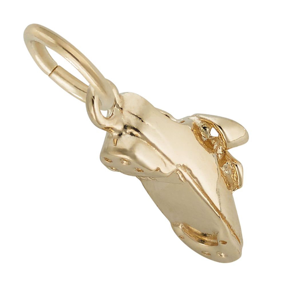 Bottom and side of a polished gold tap shoe charm with detailed nails and bow, shown on a plain white background