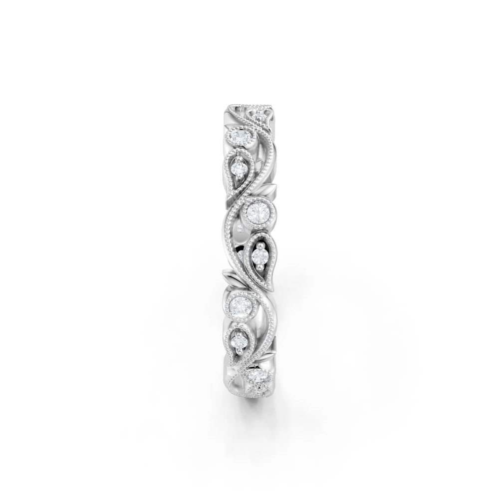 Silver ring with diamond accents on a white background