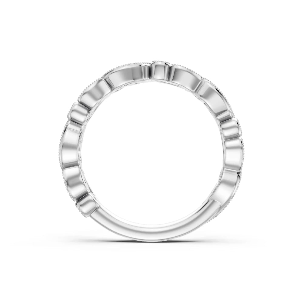 Silver ring with beaded design on a white background
