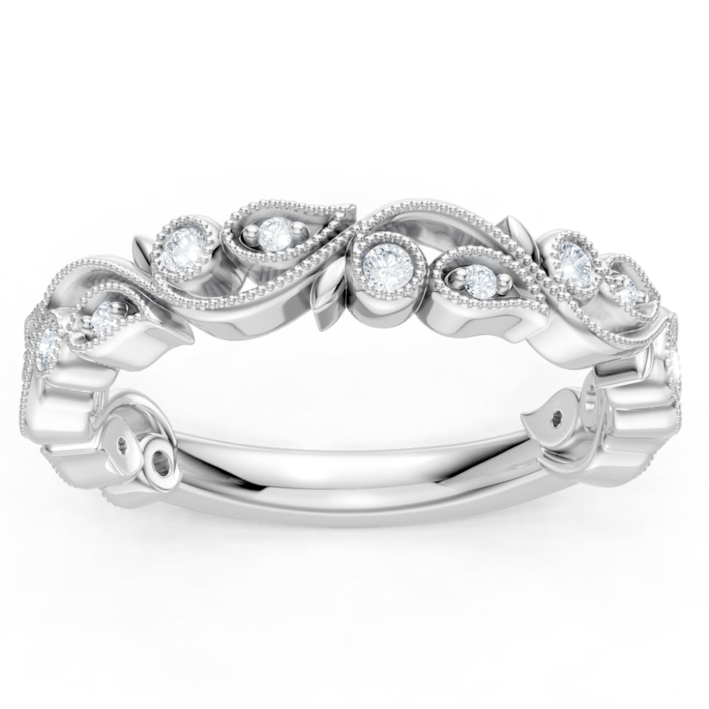 Silver ring with floral design and embedded diamonds on a white background