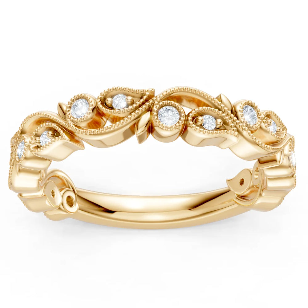 Gold ring with diamond accents on a white background
