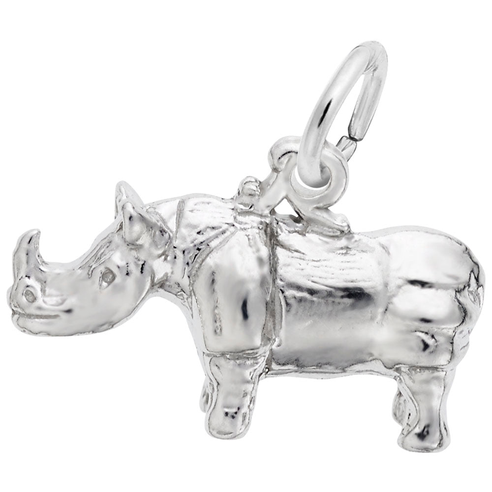 Silver rhinoceros charm on a white background