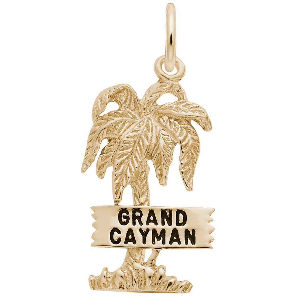 Gold charm with palm tree design and 'Grand Cayman' text on a white background