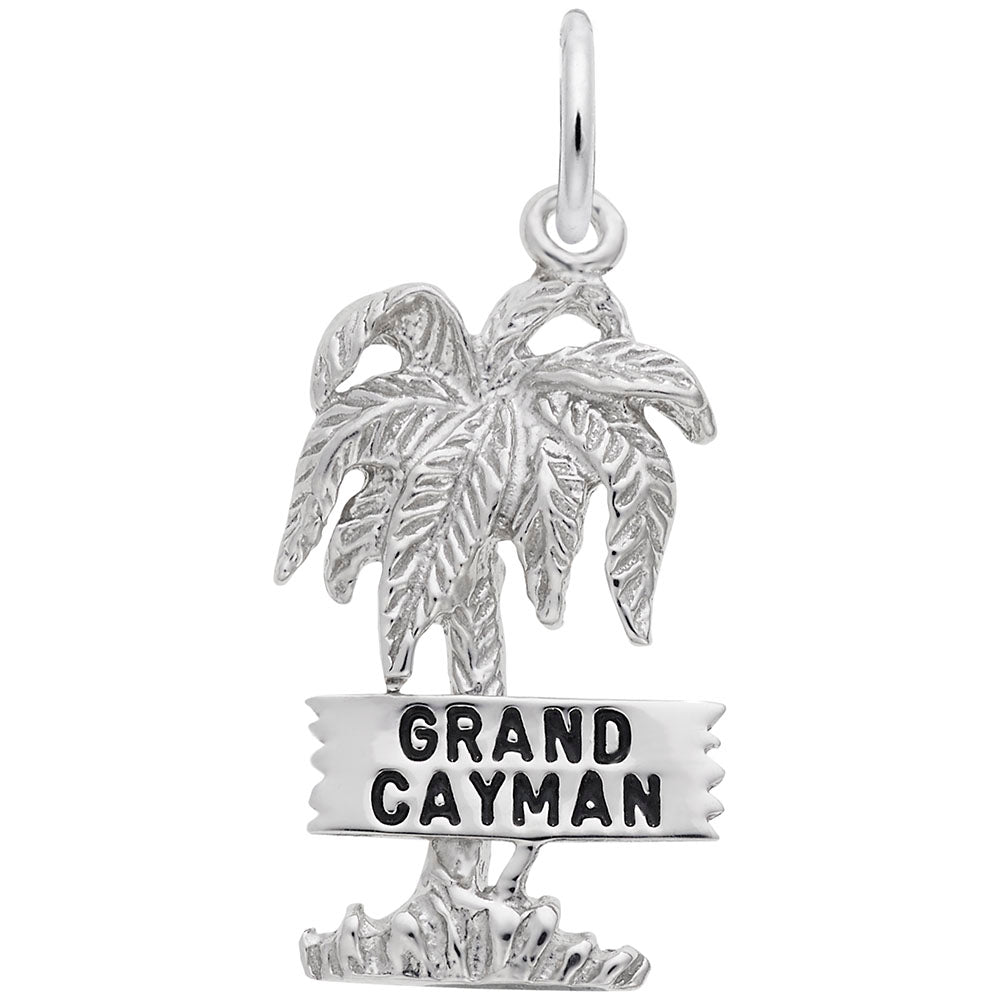 Silver charm with palm tree design and 'Grand Cayman' text on a white background