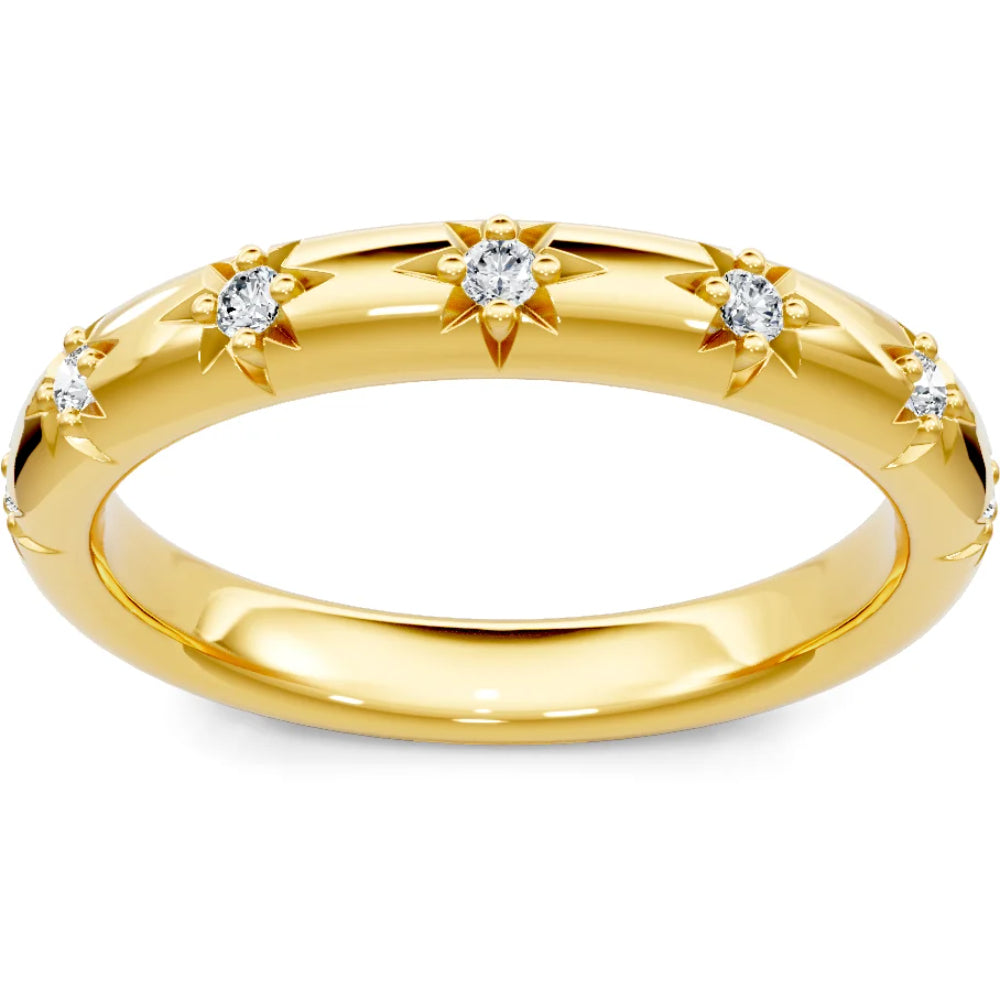 Gold ring with diamond accents on a white background