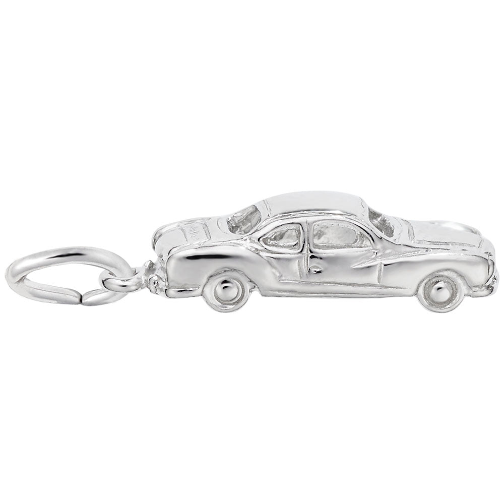 Silver car-shaped charm on a white background