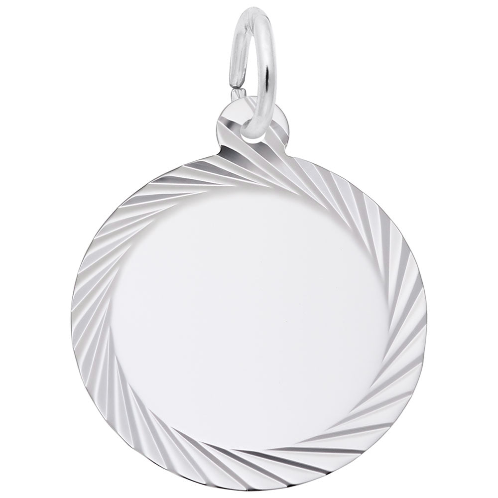 Silver disc charm with wavy design on a white background