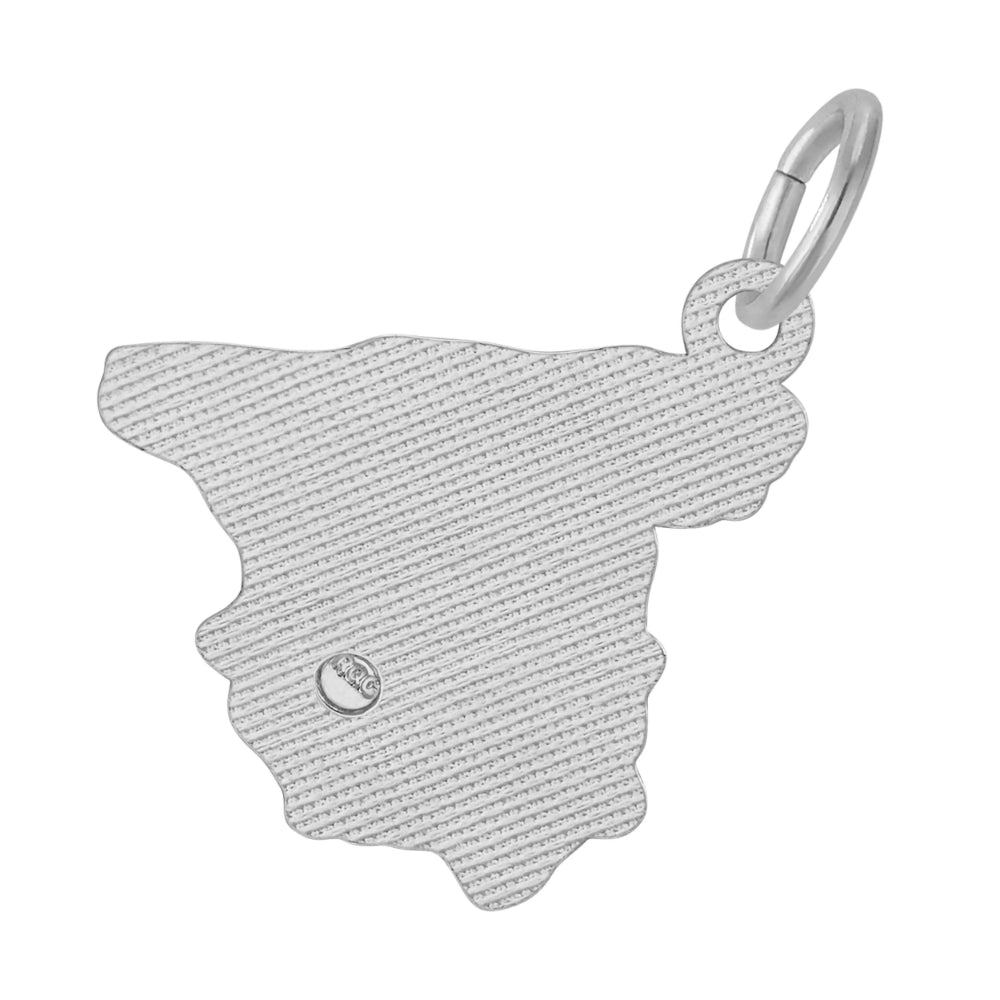A silver charm shaped like the map of Spain, featuring a textured surface and a small circular logo near the center, shown on a plain white background.