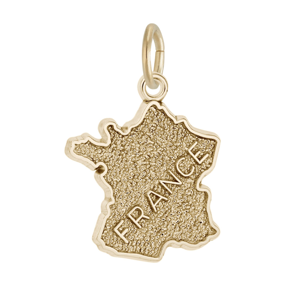 Gold charm shaped like a map of France with 'FRANCE' engraved on a white background
