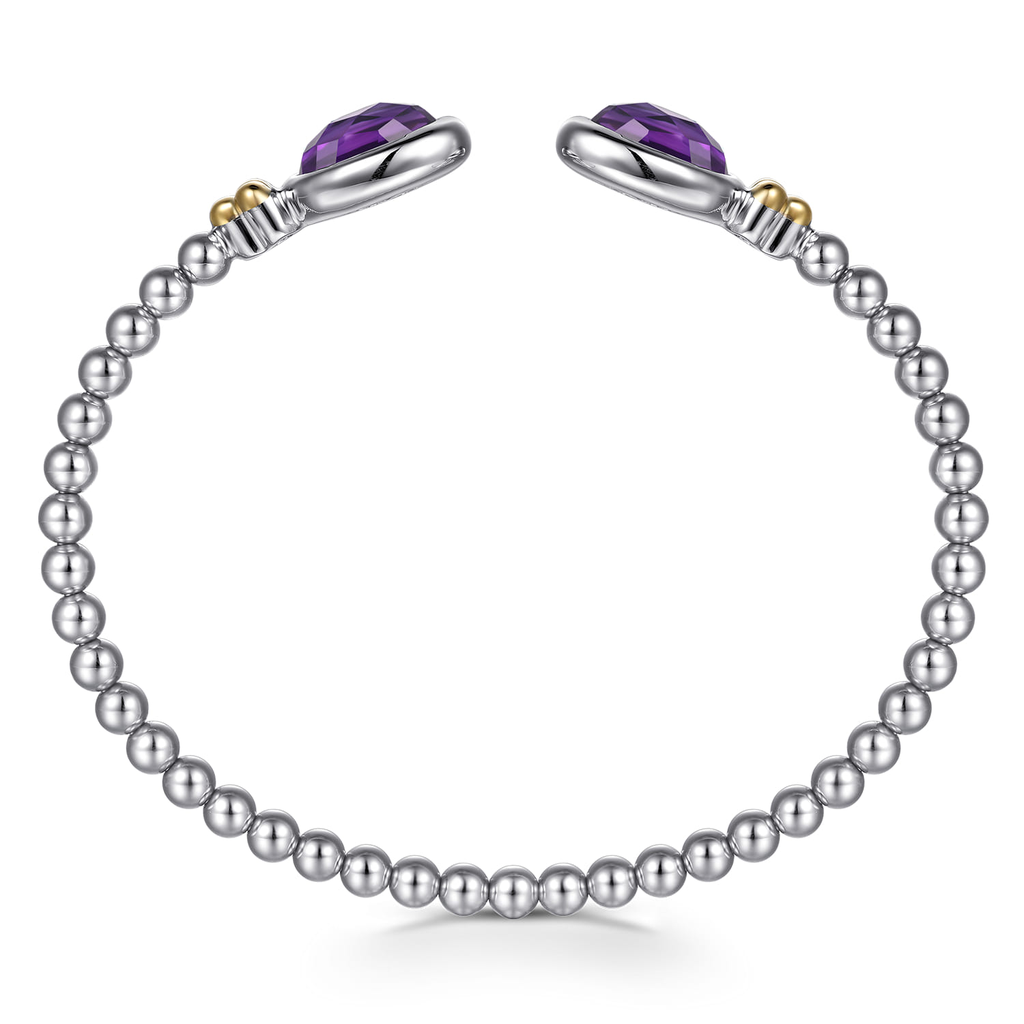 Silver beaded bracelet with purple gemstones on a white background