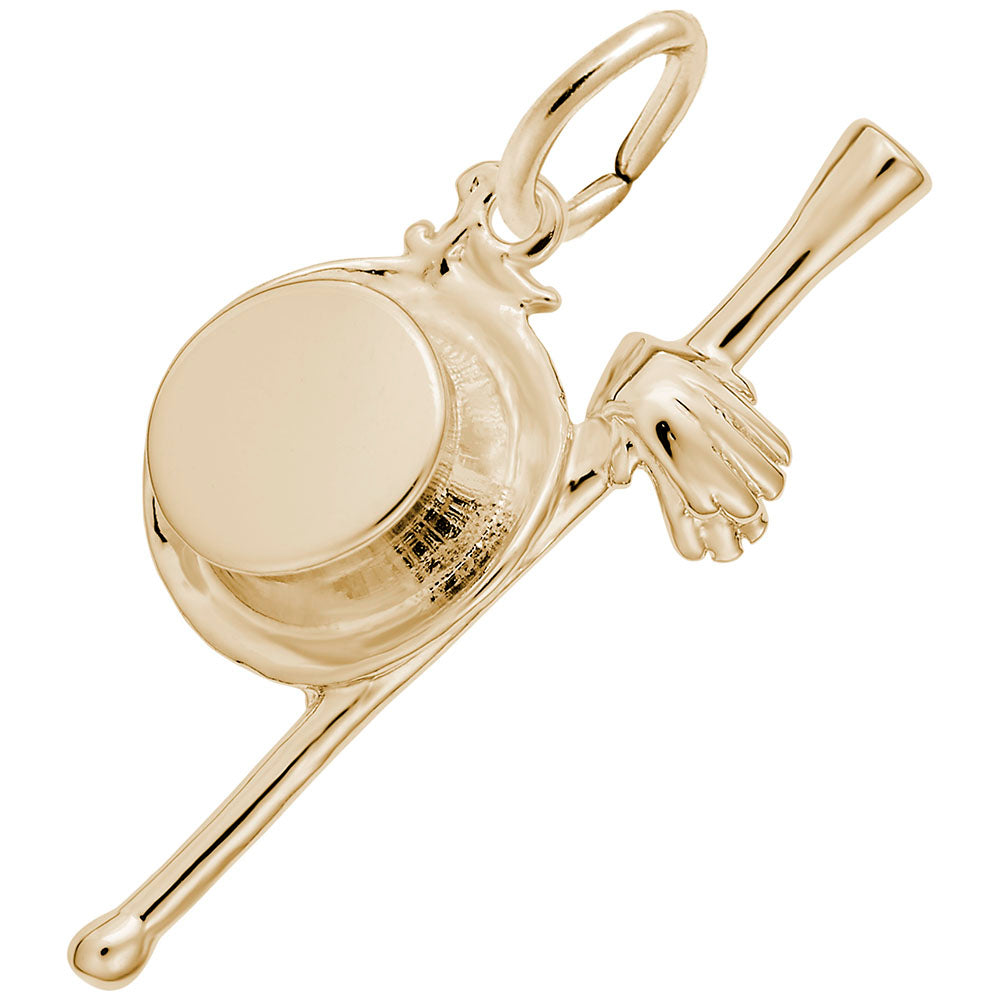 Gold charm resembling a top hat, gloves, and baton shown on a white back ground