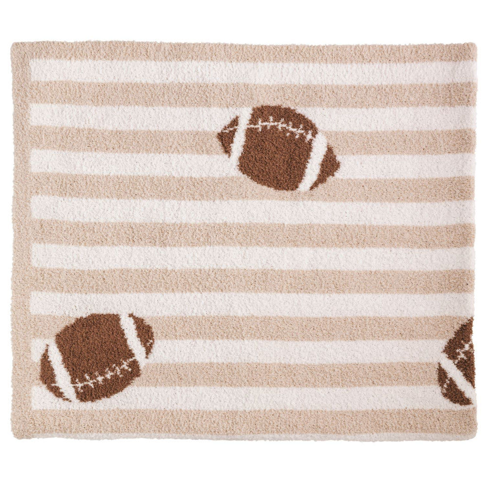 Beige and white striped blanket with football designs on a white background