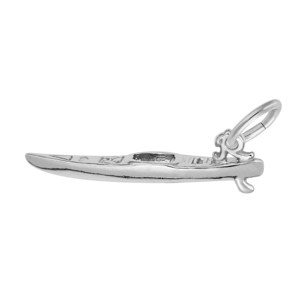 A silver Kayak charm, featuring a central oval opening and geometric engravings, shown on a plain white background.