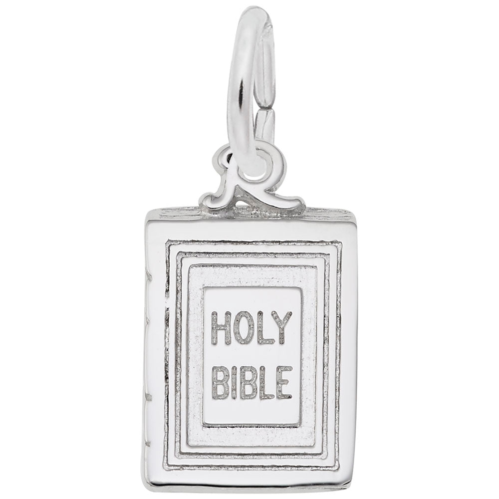 Silver 'Holy Bible' charm on a white background