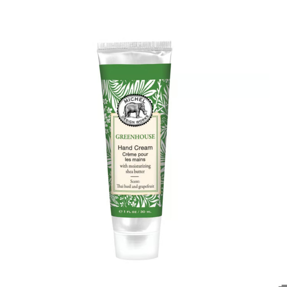 A squeeze tube of Midge & Co. Greenhouse Hand Cream, featuring a green and white tropical leaf pattern with a cream-colored central label, set against a plain white background.