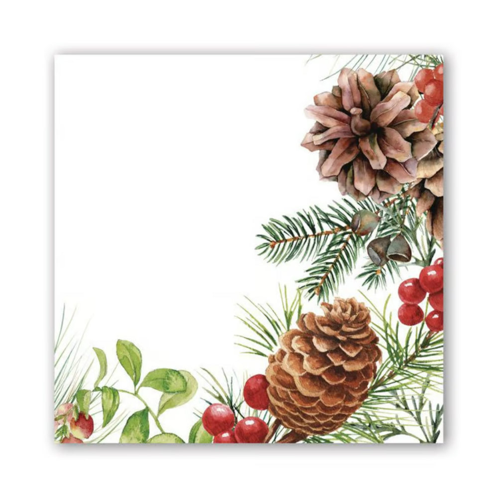 White napkin with white spruce branch and pine cones on a white backround. 