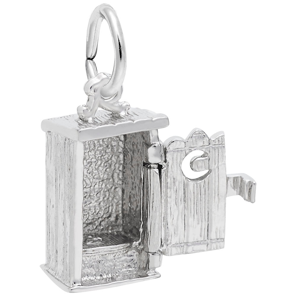 Silver Outhouse charm with detailed boards and an open door with a  moon shaped hole, shown on a white background